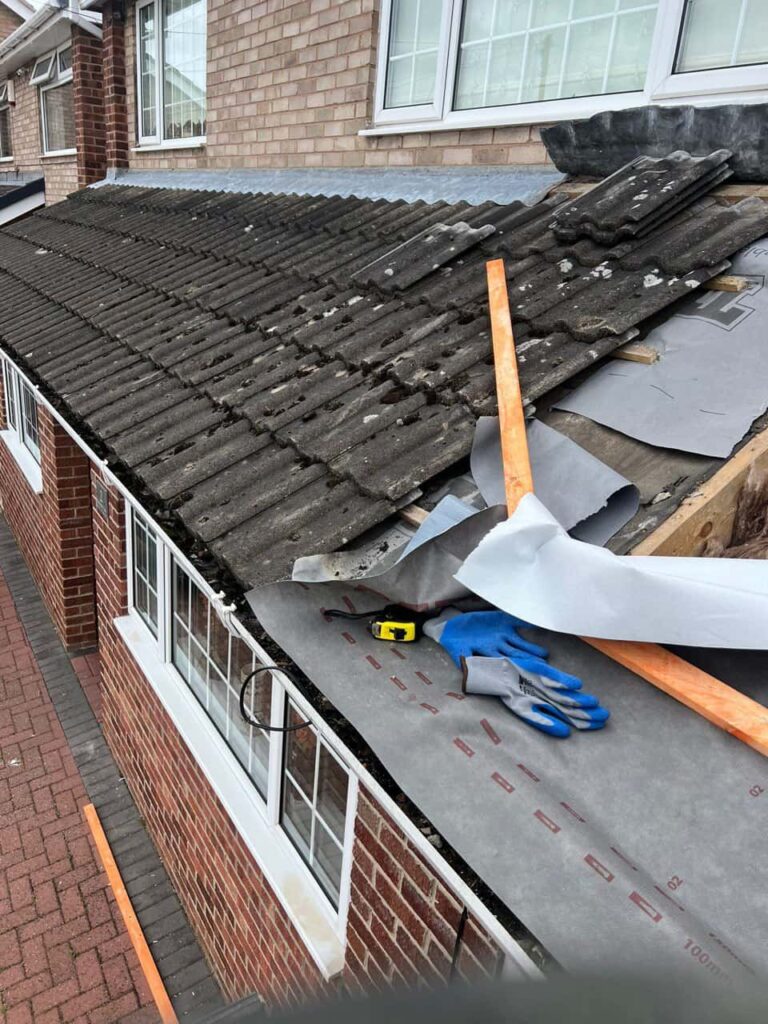 This is a photo of a pitched roof which is being repaired. The existing roof was leaking badly. Works carried out by MCM Roofing Repairs New Milton